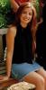 Ada Nicodemou in black top and jeans skirt