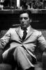 Al Pacino resting on a chair
