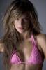 Alessandra wearing a pink bra