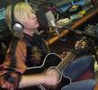 Alex Band playing guitar