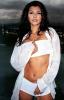 Ali Landry in a short white dress