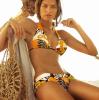 Aline Nakashima dressed in a very sexy swimsuit