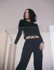Alizee smiling in black