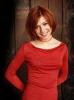 Alyson Hannigan wearing a red blouse