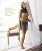 Amanda Bynes holding the curtain