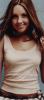 Amanda Bynes wearing a cream top