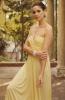 Amanda Peet Posing Infront Of Pillars