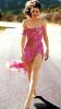 Amanda Peet walking in a very sexy pink dress
