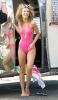 AnnaLynne McCord in a pink swimsuit