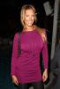 Annalise Braakensiek in a sexy purple dress