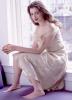 Anne Hathaway Sitting Near The Window