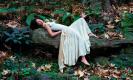 Ashley Judd on a Tree Trunk