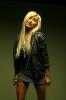 Ashley Tisdale Standing With Hair Falling On Her Face