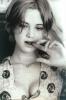 Asia Argento with Finger in her Mouth