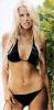 Beth Ostrosky in a black swimsuit