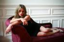 Billie Piper on a couch
