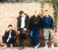Blur Standing In Front Of Wall