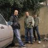 Blur Standing Near Car