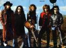Bon Jovi And Band Showing Guitar