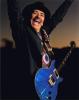 Carlos Santana celebrating
