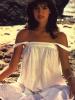 Cates Wearing a White Dress