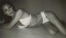 Christy Turlington wearing a white bikini