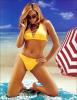 Clara Morgane wearing yellow bikini