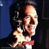 Clint Eastwood holidng the award