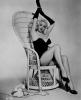 Dashing Diana Dors on chair