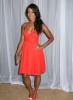 Denyce Lawton in a orange dress