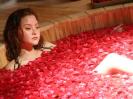 Devon Aoki in a bathtub full of rosses
