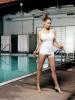 Diora Baird at a swimpool
