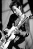 Dolores O Riordan playing guitar