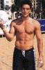 Eddie Cibrian having football in hands
