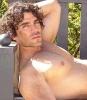 Eduardo Verastegui having sun tan