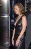 Elizabeth Perkins in a black dress