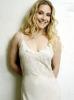 Emily Procter dressed in white