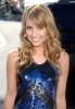 Emma Roberts in a blue dress