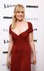 Emmanuelle Seigner in a red dress