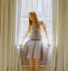 Faith Evans in a white dress