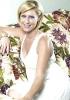 Faye Tozer in a white dress