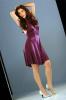 Flavia Alessandra in a purple dress