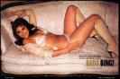 Jamie Lynn Sigler lying on sofa