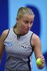 Jelena Dokic holding tennis ball