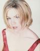 Jennie Garth posing