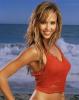 Jessica Alba posing for a photo at the beach
