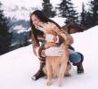 Jill De Jong Playing with a Dog