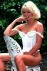 Jo Guest Sitting on a Chair