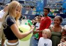 Kat DeLuna Giving An Autograph