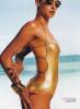 Kristy Hinze in a Gold SwinSuit